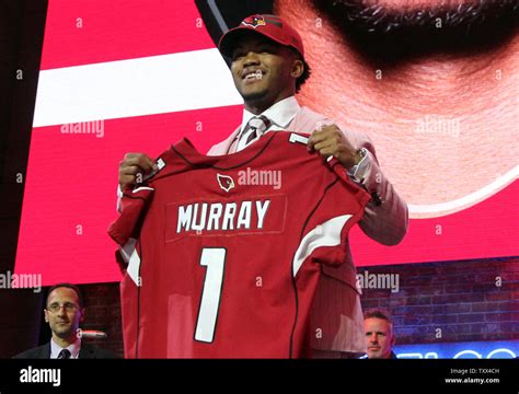 Oklahoma S Kyler Murray Holds Up A Jersey After Being Drafted Number