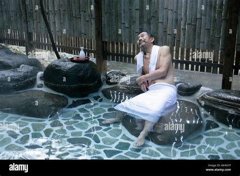 Man In Hot Spring Stock Photo Alamy