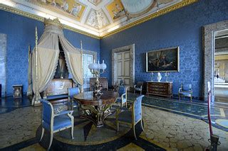 An Ornately Decorated Room With Blue Walls And Ceiling