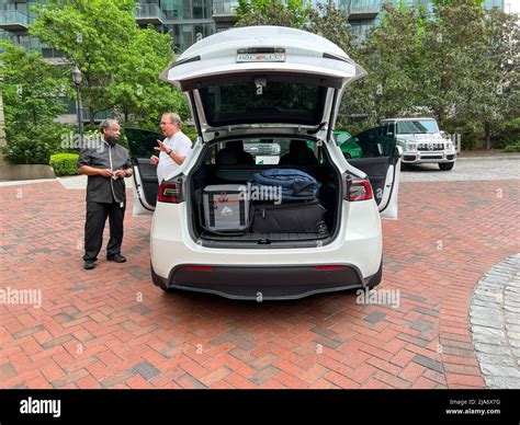 Atlanta Ga Usa May 1 2022 A Tesla Car Trunk Packed With A Suitcase