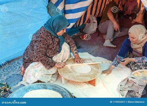 Iranian Woman Preparing Traditional Bread On The Street Market In