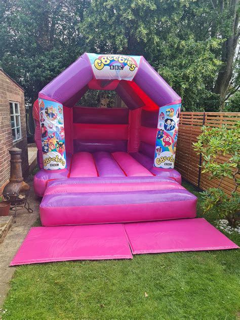 Pink Purple Cbeebies Castle Best Inflatables Hire Service In London