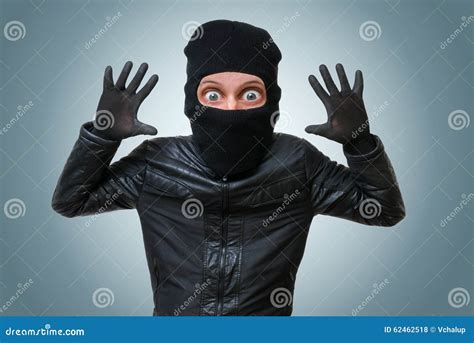 Funny Childlike Burglar Puts Hands Up. Stock Photo - Image of ...