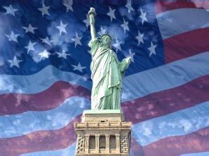 The Statue of Liberty with American flag background (wallpaper 6695)