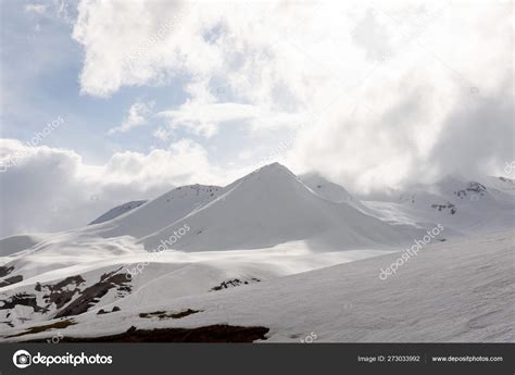 Snow Capped Peaks Of The Caucasus Mountains Landscape Along The