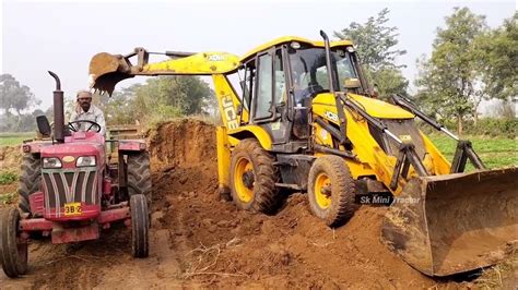 Jcb 3dx Backhoe Machine Working With Two Mahindra 265 Di 575 Di