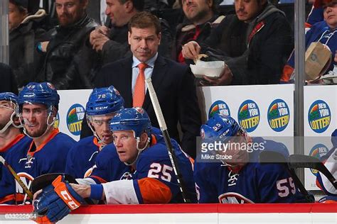 Head Coach Doug Weight Of The New York Islanders Looks On From The