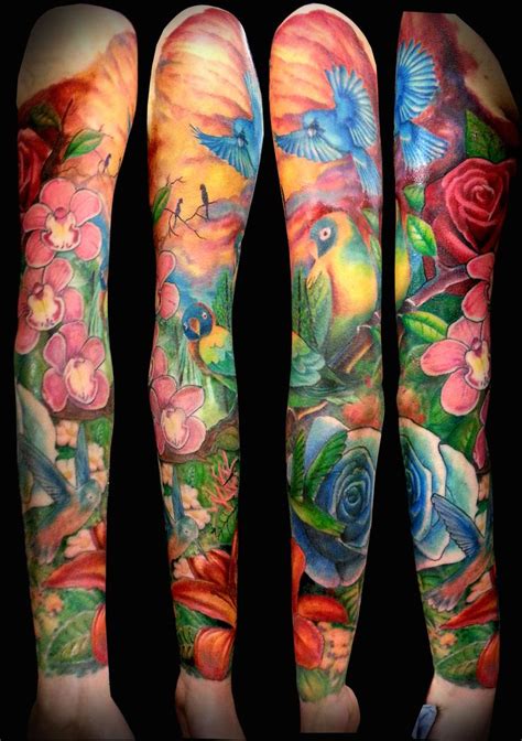 Three Different Colored Tattoos On Both Arms And Legs With Birds