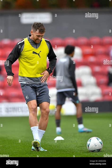 Plymouth Argyle Defender Dan Scarr Warming Up During The Emirates