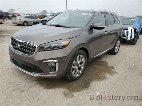 Report 5XYPKDA57KG462031 KIA SORENTO 2019 BROWN GAS Price And Damage