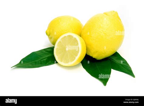 Lemon with leaves Stock Photo - Alamy