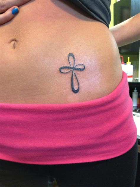 Infinity Cross Tattoos - cross around an infinity symbol that makes the ...