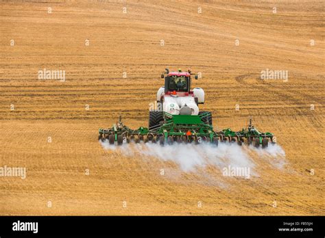 Case Quadtrac Tractor Pulling An Anhydrous Ammonia Tank And Applicator
