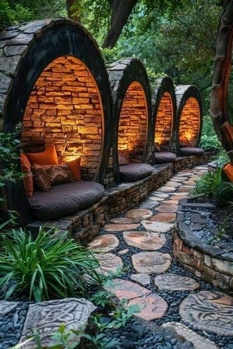 An Outdoor Seating Area With Stone Walls And Benches In The Middle