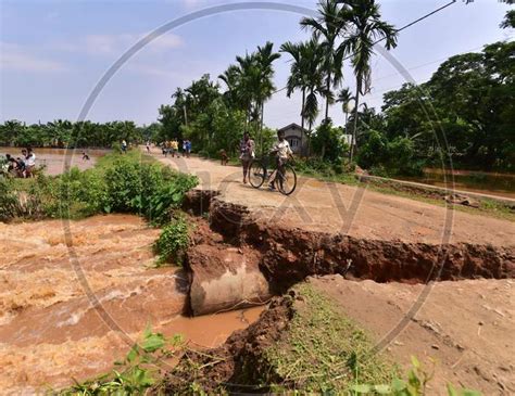 Image Of Floodwaters Washed Away A Portion Of A State Pwd Road At The