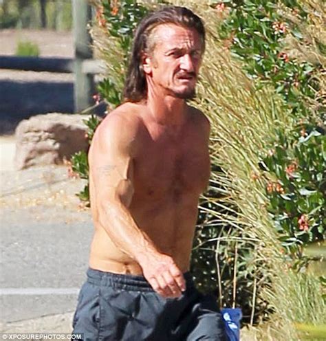 Sean Penn 52 Shows Off His Bulging Biceps As He Goes Shirtless On The