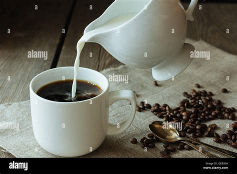 Milk Pouring In Coffee Hi Res Stock Photography And Images Alamy