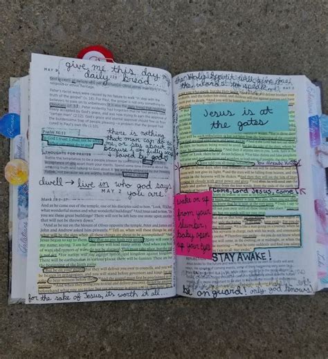 An Open Book With Writing On It And Some Magnets Attached To The Pages