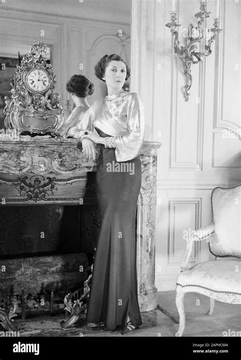 Countess of Paris Description: The Countess of Paris poses in a Hôtel in Paris in a dress by ...