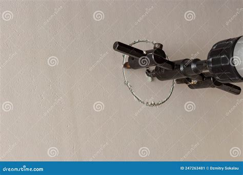 Drill While Drilling A Hole In Drywall Close Up Stock Image Image Of