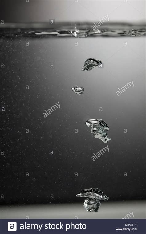 water bubbles rising   surface stock photo alamy