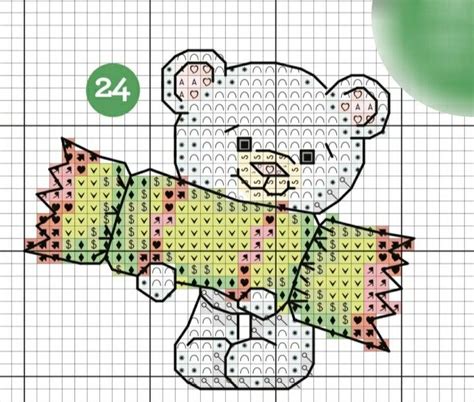 A Cross Stitch Teddy Bear Holding A Fish