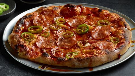 Hot Sopressata Red Onion And Jalapeno Pizza With Hot Chili Oil And