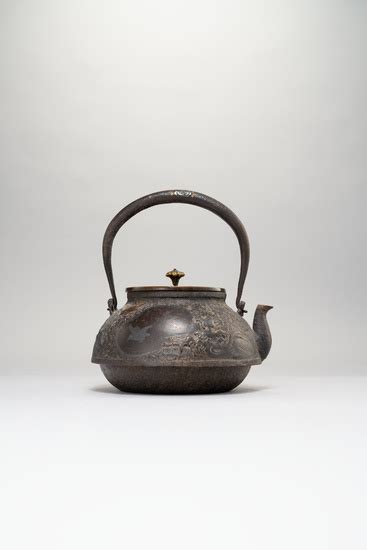 A Japanese Inlaid Cast Iron Tetsubin Tea Kettle And Cover By The