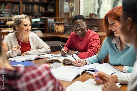 Happy College Students Studying Together Stock Photo Adobe Stock