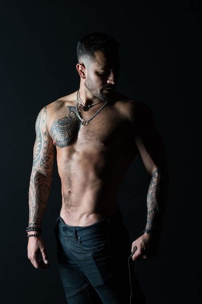 Premium Photo Bodycare With Fitness And Sport Man With Tattooed Arm And Chest Bearded Man With