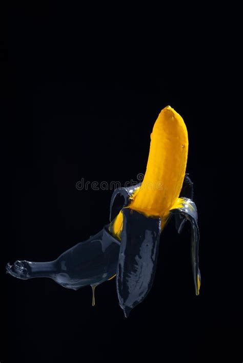 Banana Paint. Yellow-black Painted Banana on a Black Background ...