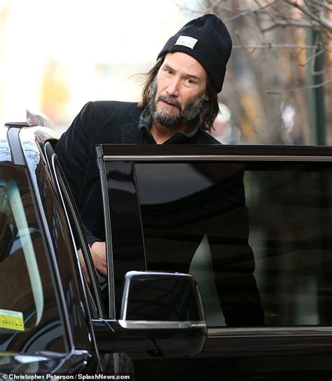 Keanu Reeves Wears All Black With A Scruffy Beard Outside A New York