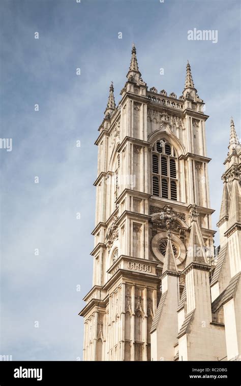 Westminster Abbey Facade Fragment Under Light Blue Sky One Of The Most