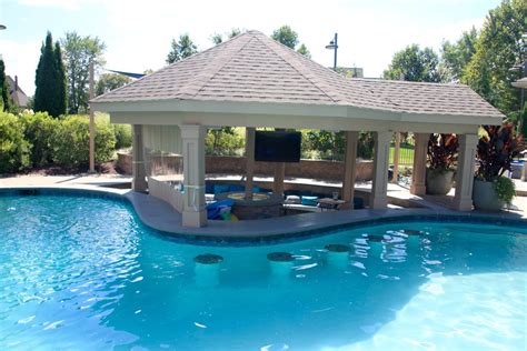 Custom Freeform Pool With Swim Up Bar And Waterslide Contemporary