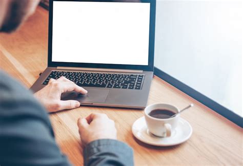 Premium Photo Adult Successful Bald Bearded Man In Suit With Laptop