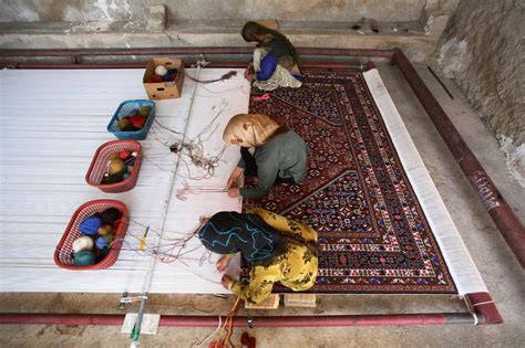 Afghan Woman Weaves Not Carpet But Her Dreams The Kabul Times