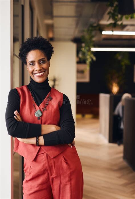 Portrait Of Confident Mature Black Woman Smiling And Looking At Camera