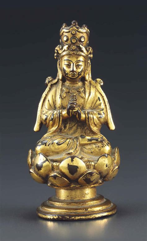 A SMALL GILT BRONZE FIGURE OF BUDDHA VAIROCHANA LIAO DYNASTY AD 907