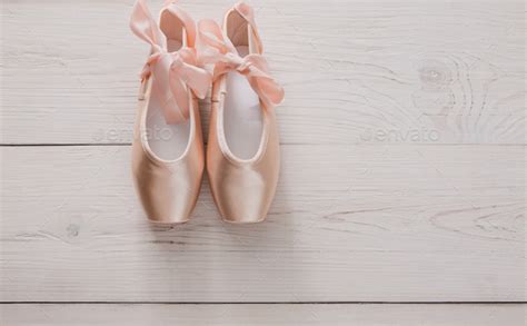 Pink Ballet Pointe Shoes On White Wood Background Stock Photo By