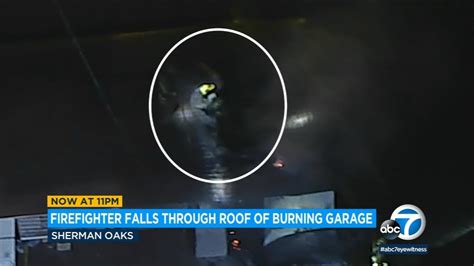 Video Lafd Firefighter Falls Through Roof Of Burned Garage As It Collapses In Sherman Oaks I