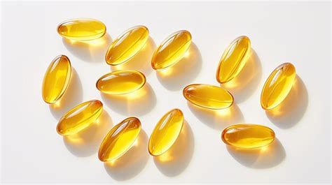 Premium Ai Image Transparent Yellow Vitamins On A Light Background