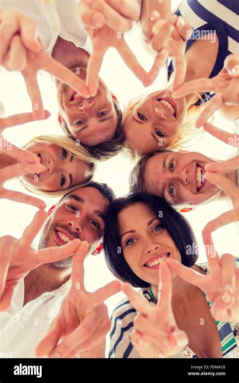 Smiling Friends In Circle Stock Photo Alamy