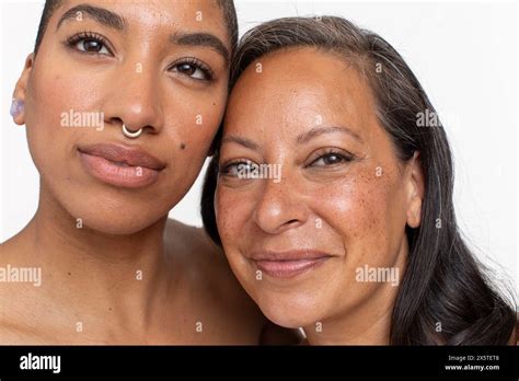 Studio Portrait Of Smiling Women Stock Photo Alamy