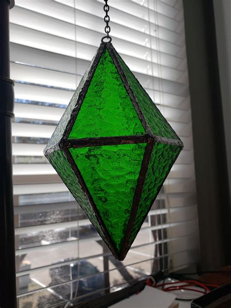 I made the green diamond from The Sims. Stained glass and solder : r/gaming