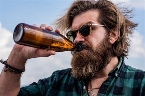 Feeling Thirsty Mature Charismatic Male Drink Beer From Bottle Guy