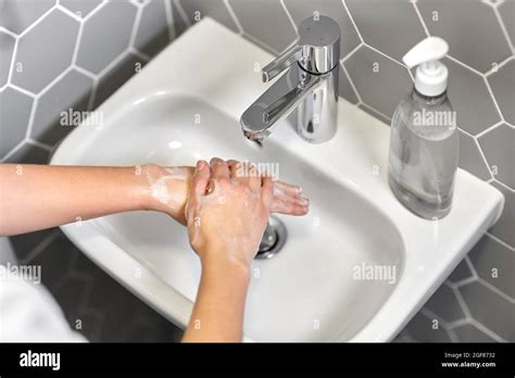 Close Up Of Woman Washing Hands With Liquid Soap Stock Photo Alamy