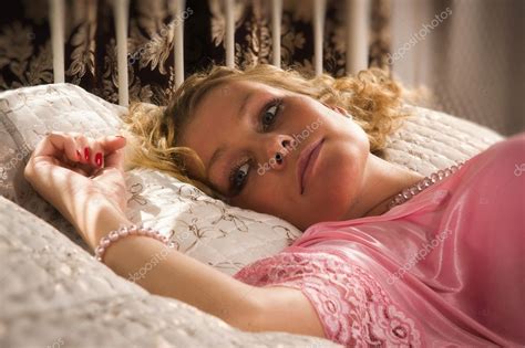 Sexual Blonde Lying On A Bed Stock Photo By Demian