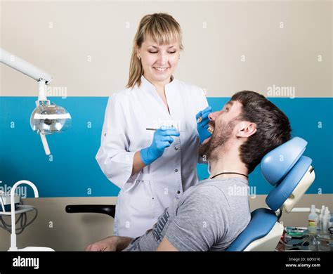 Doctor Examines The Oral Cavity On Tooth Decay Caries Protection