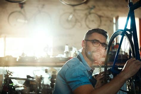 The Best Bicycle Repair Service Around Portrait Of A Mature Man