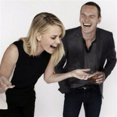 Charlize Theron And Michael Fassbender Michael Fassbender Celebrity Smiles Smiles And Laughs